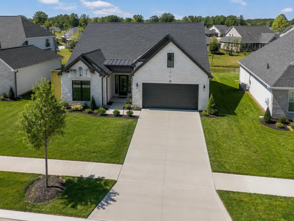 Aerial view of a sealed driveway in an Indiana subdivision